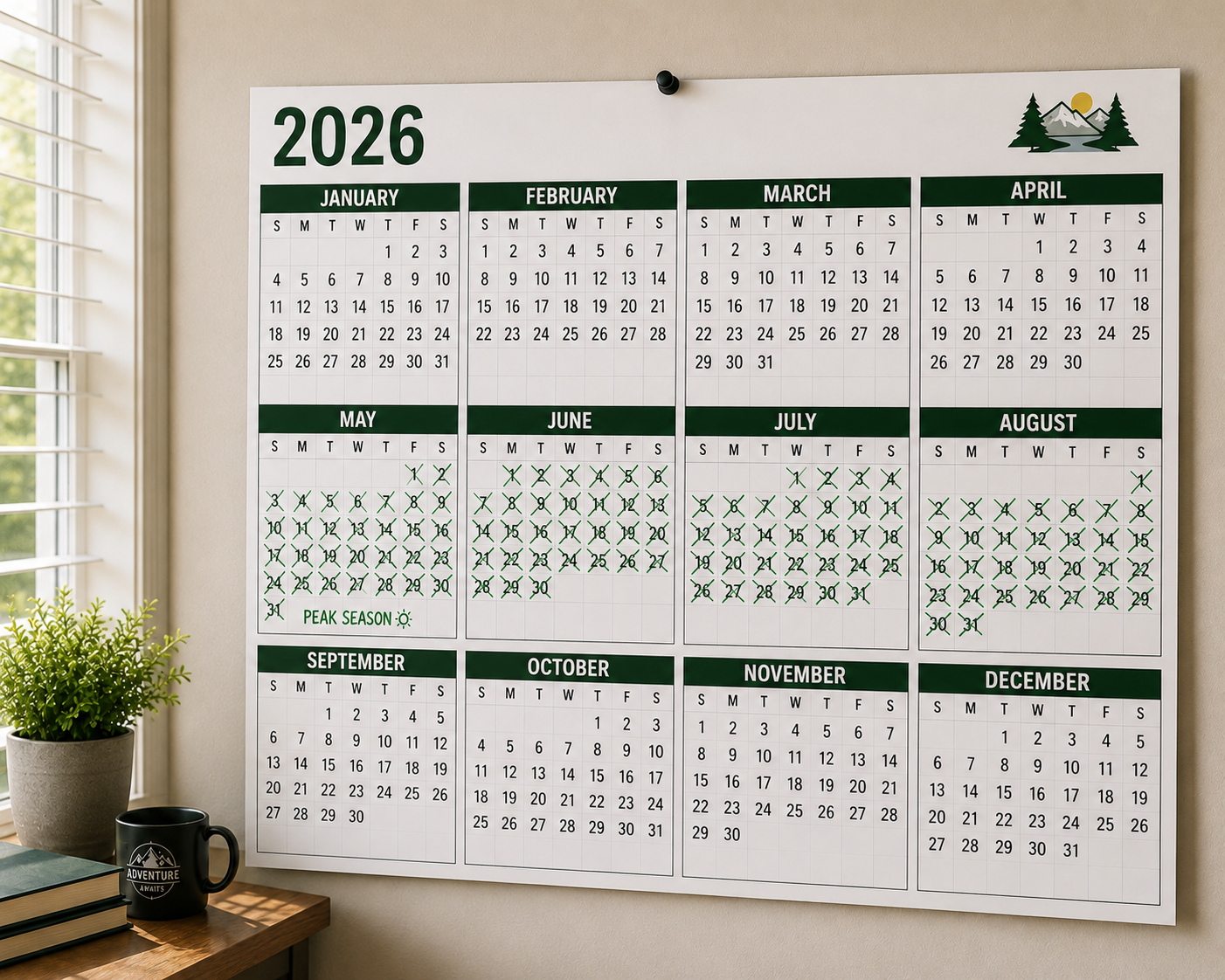 A large 2026 wall calendar hangs in a bright office, with the summer months marked off to represent the busy season. The months ahead remain largely blank, highlighting the upcoming slower season and the need for planning. Natural sunlight streams through a nearby window, illuminating a small desk with books, a coffee mug, and a potted plant. The image conveys seasonality, long-term planning, revenue forecasting, and preparing for slower business periods after peak summer operations.